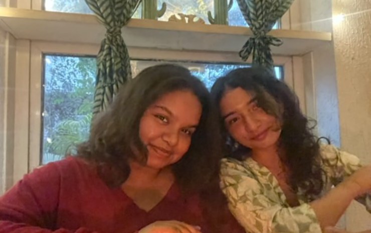 The two of us at a table by the window